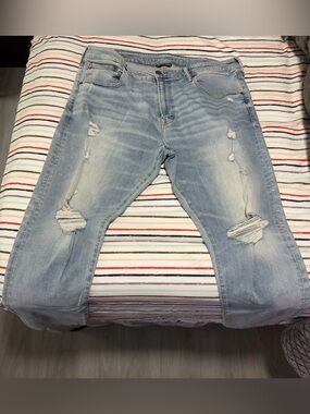 American Eagle Light Blue Distressed Men’s Jeans - Next Level Airflex